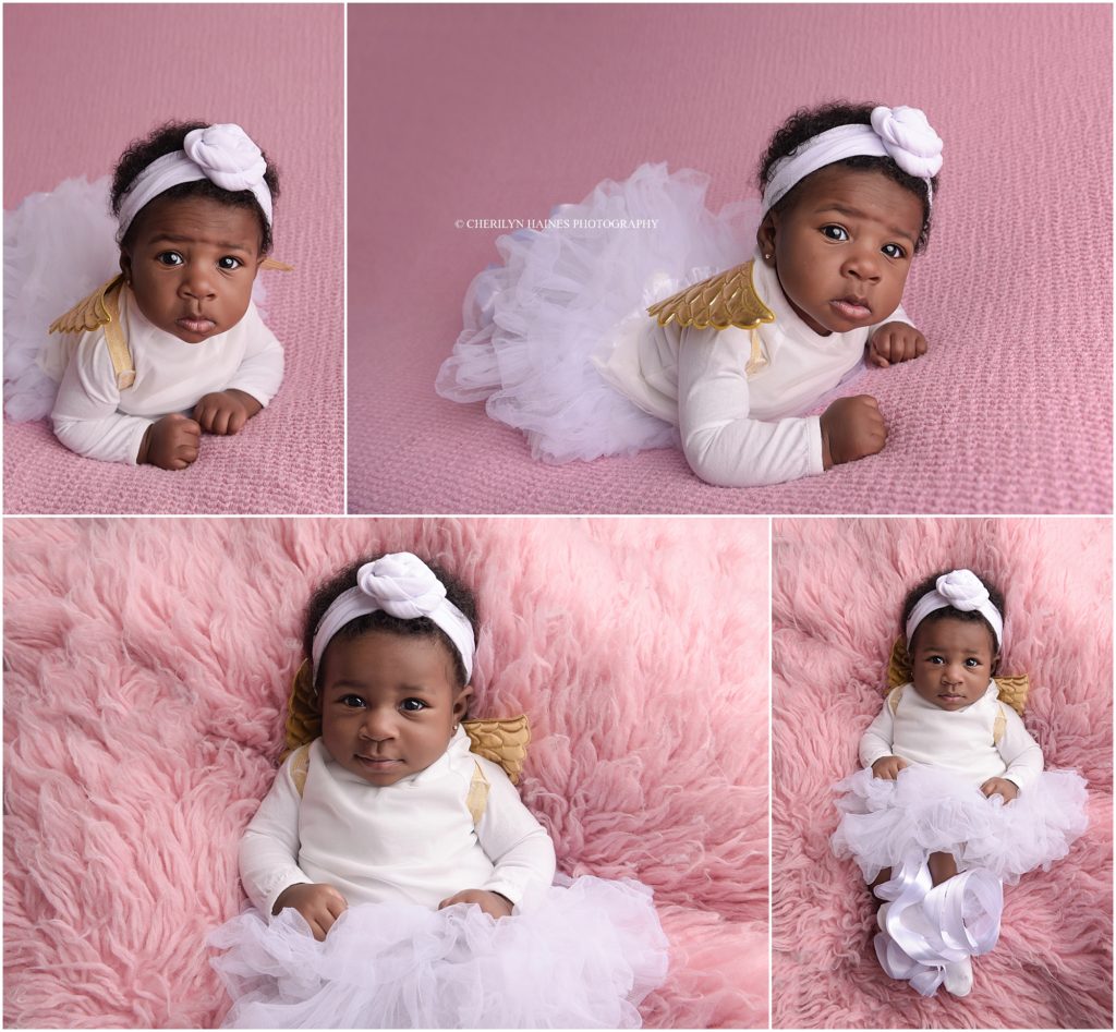 3 month old baby girl photographed on pink blankets