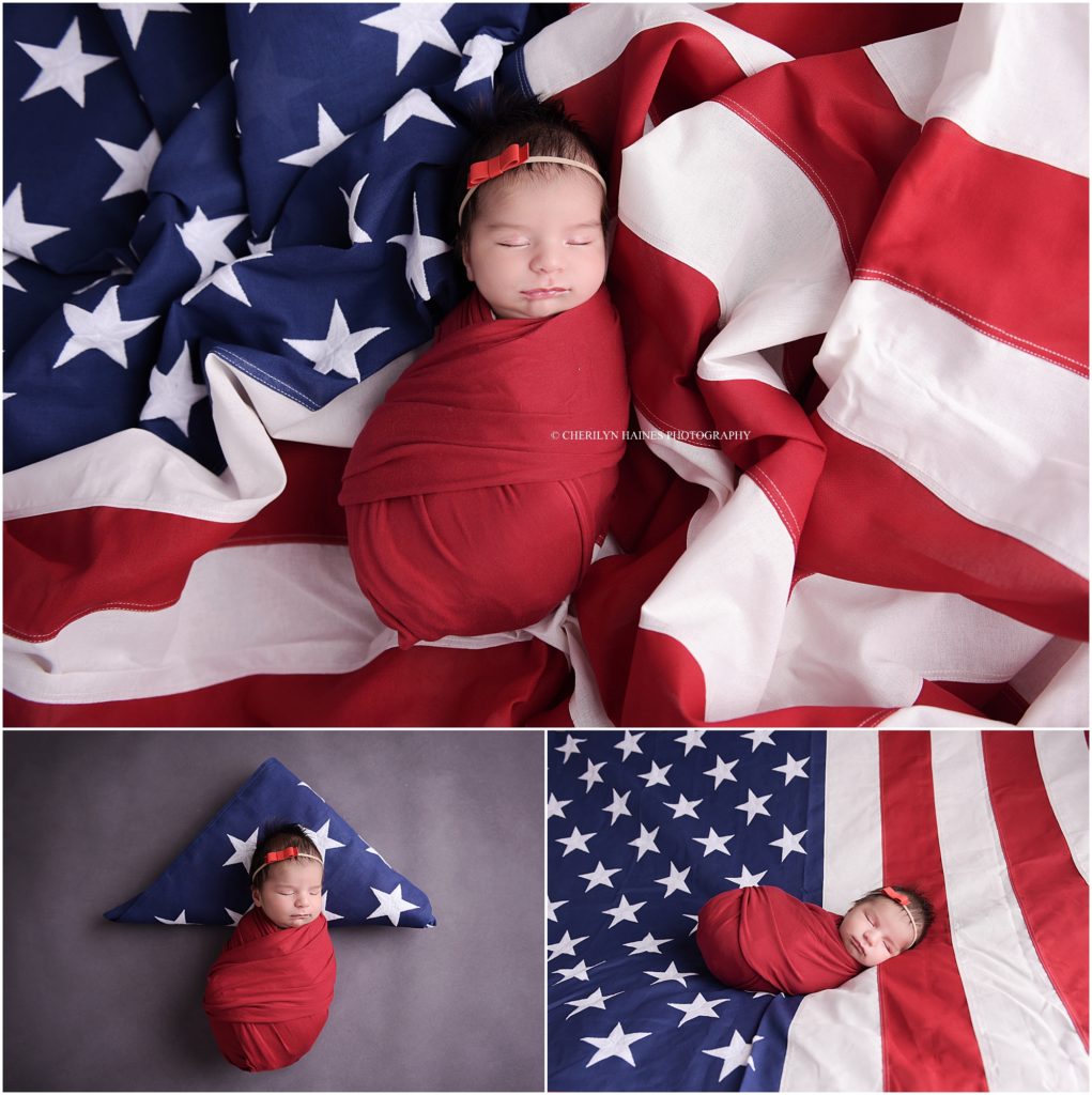 newborn baby posed iwht american flag
