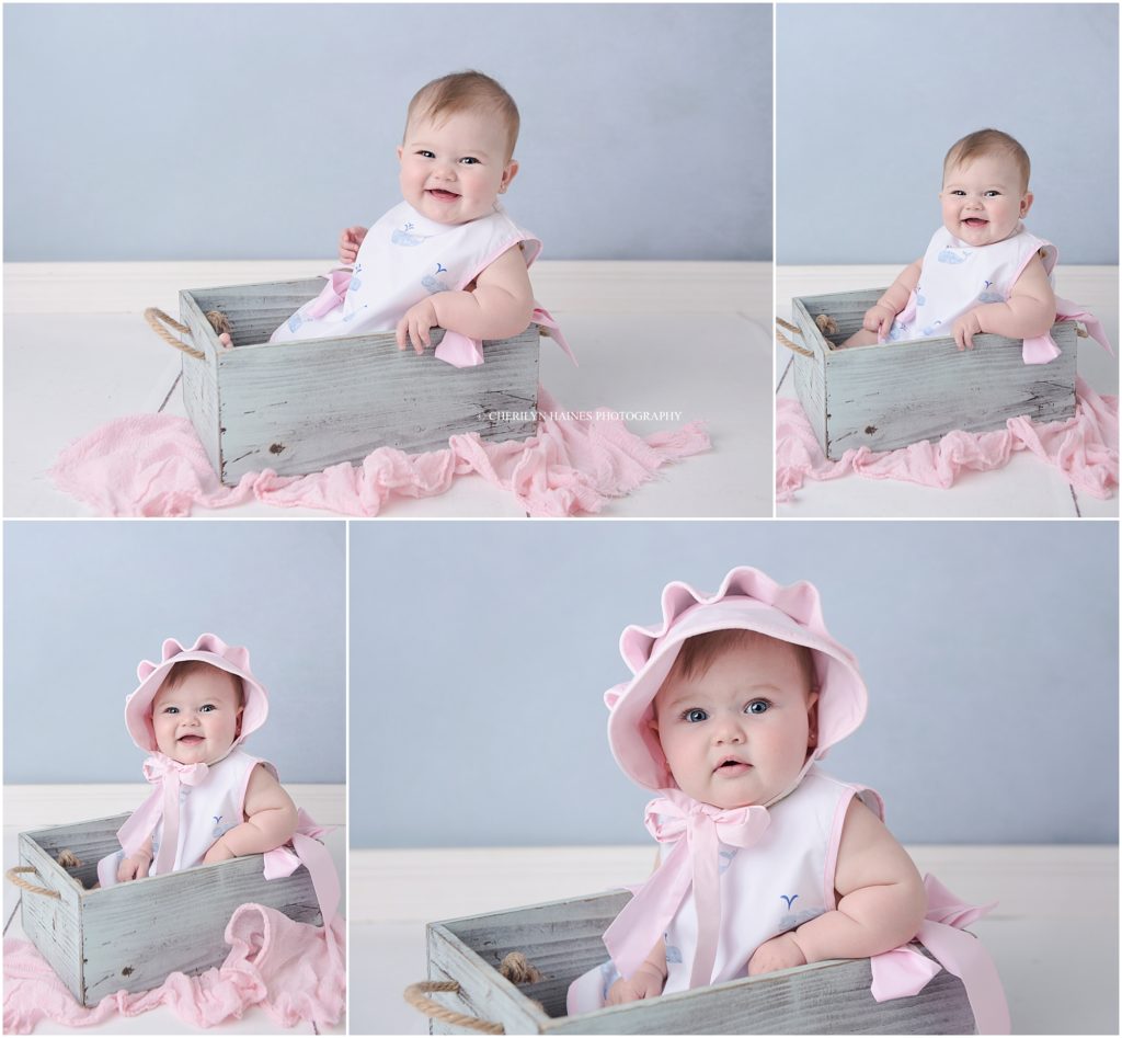 new orleans, la baby photographer; 6 month portraits; baby girl wearing a pink bonnet