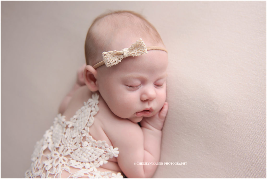 6 week old newborn baby girl photographed in baton rouge, louisiana by cherilyn haines photography